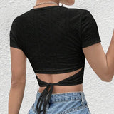 Ladies’ Solid Color Hollowed Out Knitted Back Tied Round Neck Top | Fashionable Figure-Hugging Tee