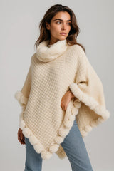 Cozy beige knit poncho with faux fur trim for women