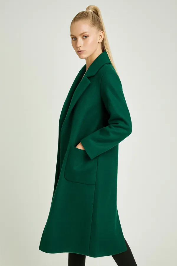 Side view of elegant green wool coat for women - minimalist long fall outerwear